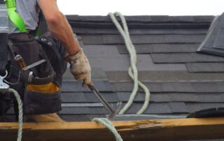 roofer standing on scaffolding