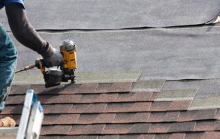 Contractor doing roof repair