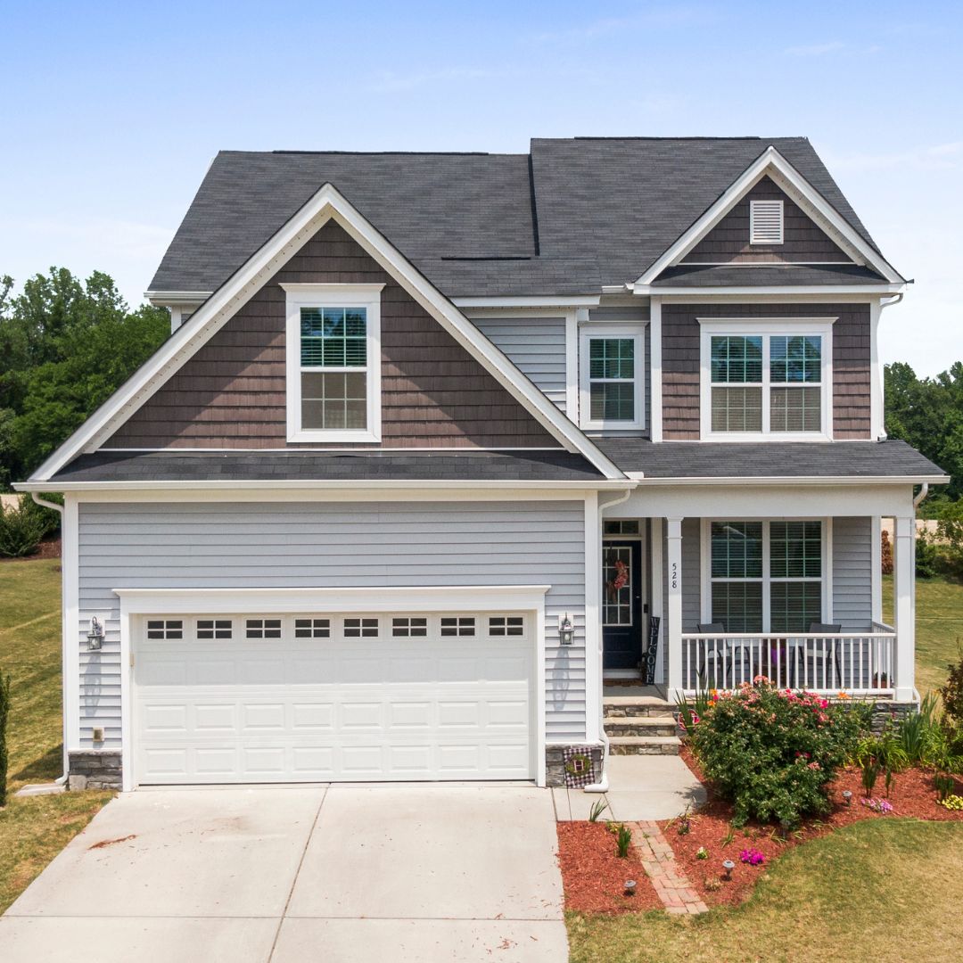 two story house with gutters