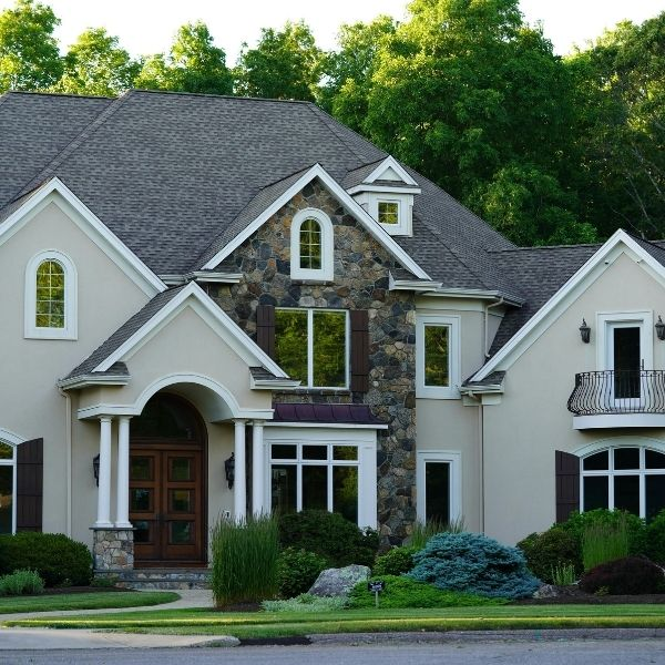 suburban home with asphalt roof